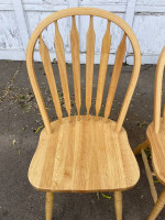 Blond Dining Table with Two Chairs