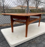 Scandinavian Modern Teak and Cane Coffee Table by Trioh Møbler.