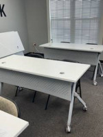 Office Furniture (partitions, conference table, desk, easels)