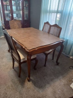 Glass dining room table with 6 chairs