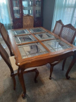 Glass dining room table with 6 chairs
