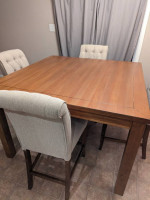 Bar height table and tufted chairs set