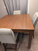 Bar height table and tufted chairs set
