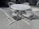 High quality wrought iron patio set. Dining table and chairs