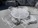 High quality wrought iron patio set. Dining table and chairs