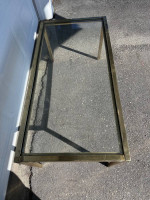 Glass topped gold framed coffee table