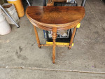 Newly refinished Burlwood half circle table.