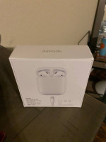 Unopened Apple airpods with charging case