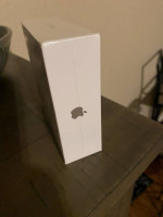 Unopened Apple airpods with charging case