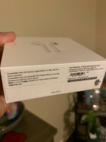 Unopened Apple airpods with charging case