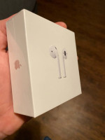 Unopened Apple airpods with charging case