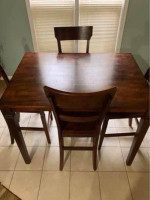 Ashley Firniture Counter Height Dining Table and 4 Bar Stools Set