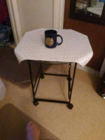 Glass wheelie tea table