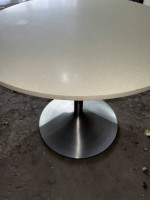 36” diameter table with stone top/brushed metal tulip base