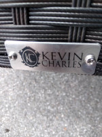 Kevin Charles outdoor chair and glass top coffee table