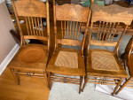 Sold square oak dining table and 4 chairs