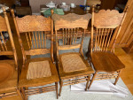 Sold square oak dining table and 4 chairs