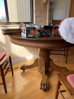 Solid oak claw foot round table with 3 leaves and 3 chairs