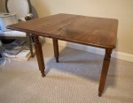 Shape shifting folding wood table   34x34” open and 17x34” closed.