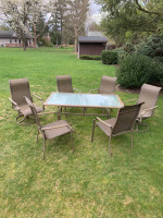 Large outdoor patio table and six chair set all for one price of