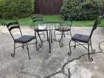 Heavy glass top real Wrought iron table/chairs-New $1800-I’m asking