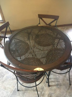 cane and wood dining glass top table and 4 chairs set in great shape