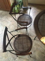 cane and wood dining glass top table and 4 chairs set in great shape