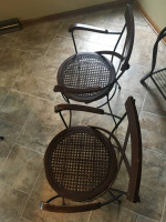 cane and wood dining glass top table and 4 chairs set in great shape