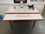 Cool retro red and white kitchen table , enamel  with aluminum legs.