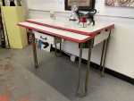 Cool retro red and white kitchen table , enamel  with aluminum legs.