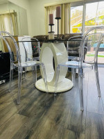 Round glass table and chairs