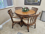 $7,000 Tommy Bahama small dining table and 4 chairs set