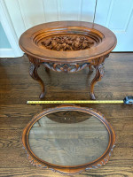 Antique carved tea table with glass lift off serving tray