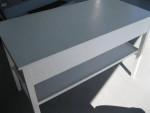 Table with drawers and shelf
