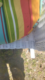 Wicker- like and wood rocker ( LIKE NEW ) with cushions and dice table