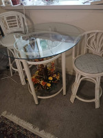 Glass topped table & two chairs