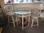 Glass topped table & two chairs
