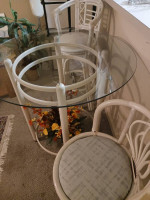 Glass topped table & two chairs