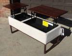 Coffee table / storage pop up tops unique very nice go see