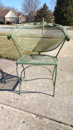 4 Wrought Iron Barrel Chairs and 1 Side Table Outside Patio