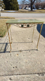 4 Wrought Iron Barrel Chairs and 1 Side Table Outside Patio