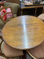 42 inch round oak pedestal clawfoot table with four fabric seat chairs