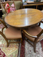 42 inch round oak pedestal clawfoot table with four fabric seat chairs
