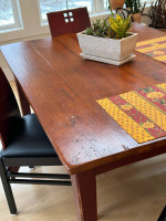Barn board top dining room table with four chairs