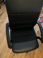 Desk chair with table and lamp