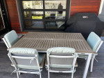 Patio table, chairs and bench with cushions