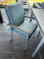 Patio table, chairs and bench with cushions