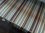 Patio table, chairs and bench with cushions