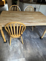Kitchen wooden table and three chairs