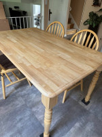 Kitchen wooden table and three chairs
